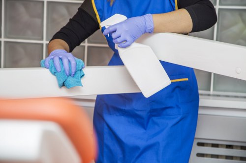 Carpet cleaner checking service details after a complaint